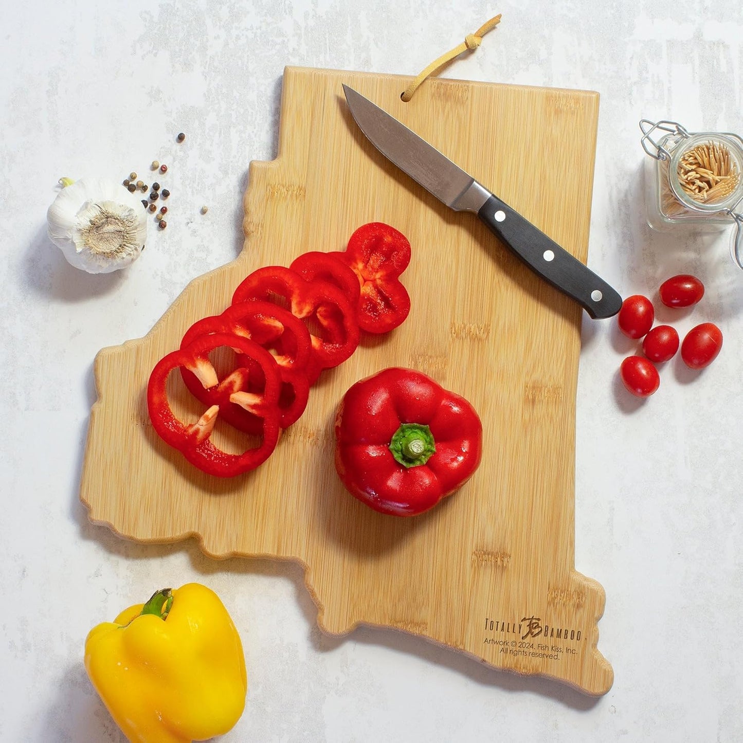 Tennessee State Shaped Cutting Board, Art by Fish Kiss | State charcuterie board with colorful hand-drawn map artwork. Smooth reverse side for food prep. Hang tie for wall display. - Colors B