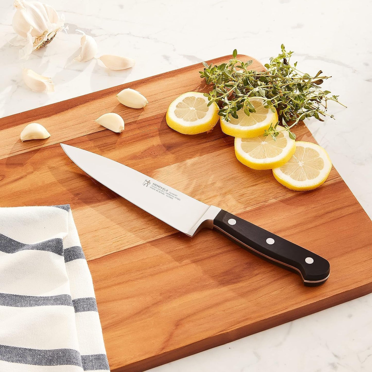 Classic 8-Inch Chef Knife, Razor-Sharp, German Engineered | Fully Forged Construction Provides Balance with Traditional Triple-Rivet Handles Enables Comfortable Easy Cutting.