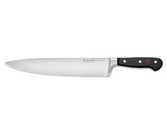 WÜSTHOF Classic 10" Chef's Knife, Black | Ergonomic handle reduces hand strain, while the tapered bolster offers a comfortable pinch grip for precise dicing.