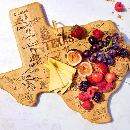 Destination Texas State Shaped Cutting Board | State charcuterie serving board with engraved map artwork. Smooth reverse side for food prep. Hang tie for wall display.