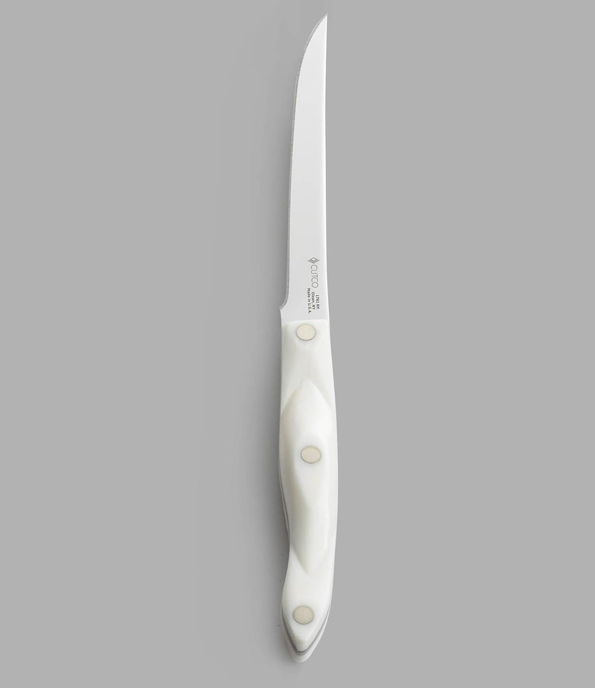 Model 1761 White (Pearl) Boning Knife with High Carbon Stainless 6.1" Straight edge blade and 5.5" handle in factory-sealed plastic bag.