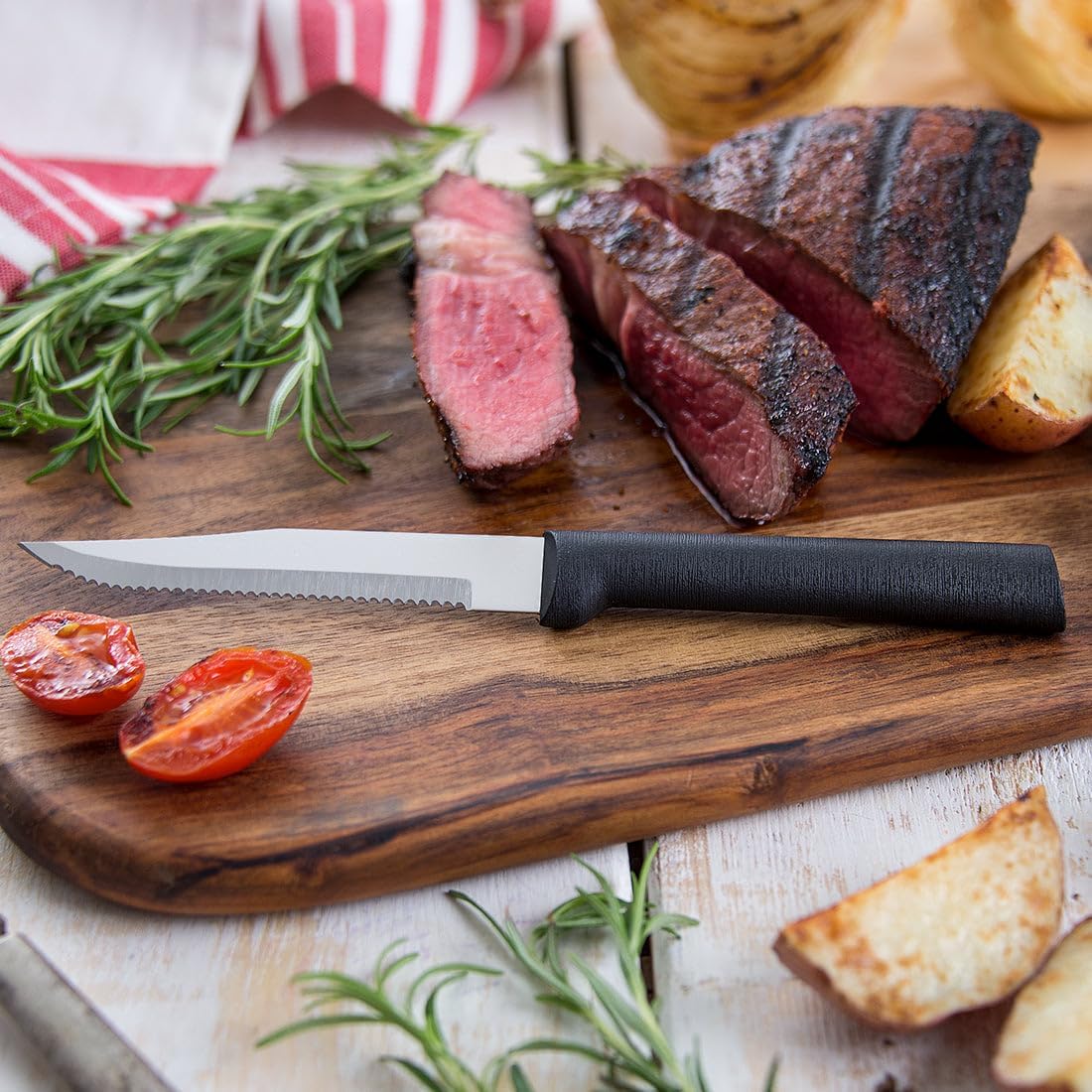 Cutlery Four Serrated Steak Knives ProPack (DG24S), Black Handle | 4-Piece Knife Set, Stainless Steel Blades, Black Resin Handle