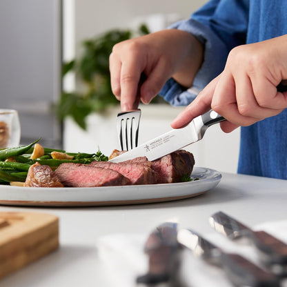 Classic Steak Knives Set of 4, Razor-Sharp, German Engineered | Fully Forged Construction Provides Balance with Traditional Triple-Rivet Handles Enables Comfortable Easy Cutting.