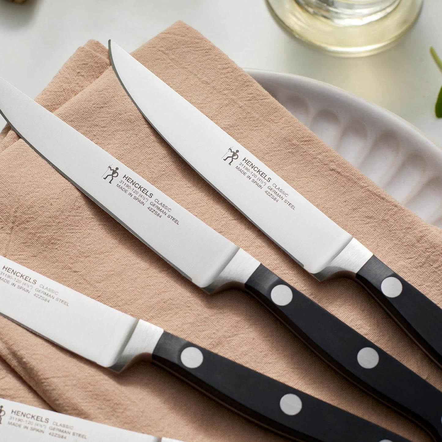 Classic Steak Knives Set of 4, Razor-Sharp, German Engineered | Fully Forged Construction Provides Balance with Traditional Triple-Rivet Handles Enables Comfortable Easy Cutting.