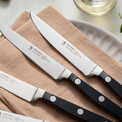 Classic Steak Knives Set of 4, Razor-Sharp, German Engineered | Fully Forged Construction Provides Balance with Traditional Triple-Rivet Handles Enables Comfortable Easy Cutting.