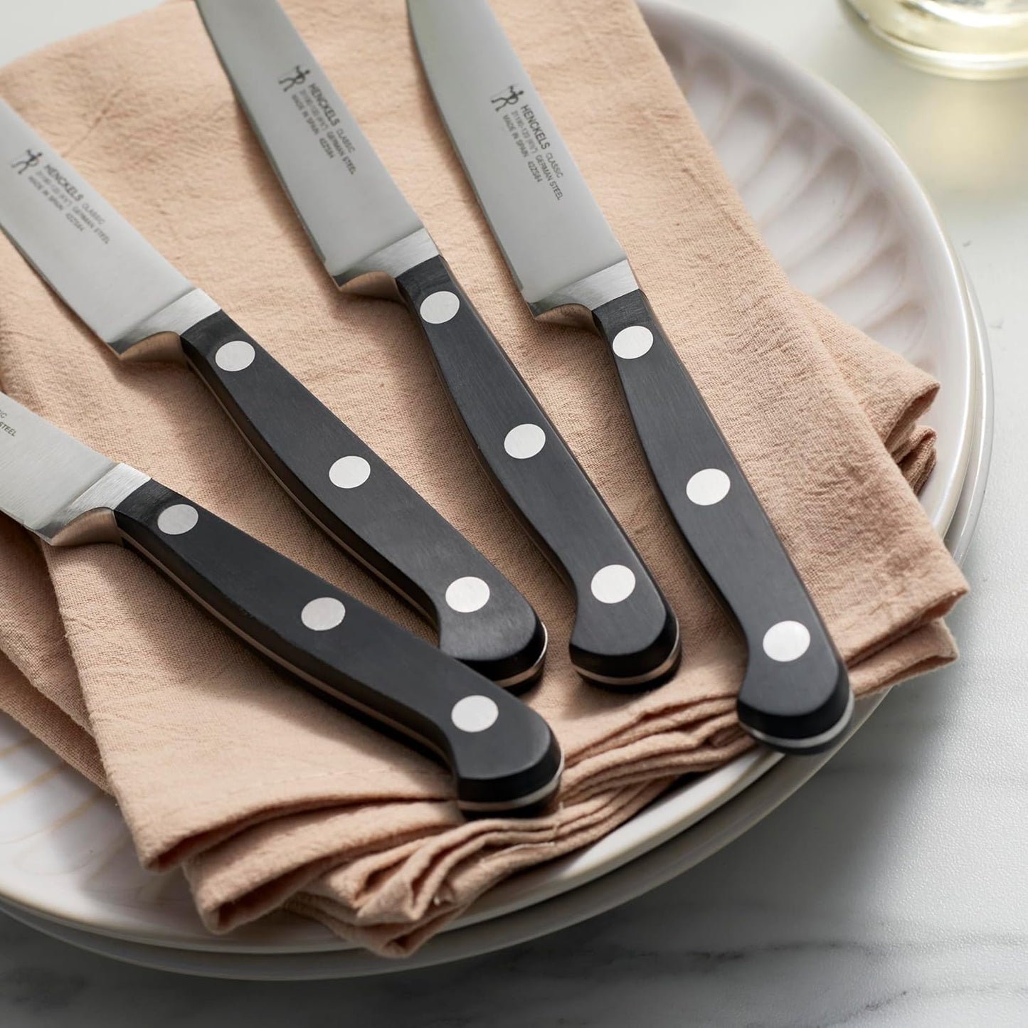 Classic Steak Knives Set of 4, Razor-Sharp, German Engineered | Fully Forged Construction Provides Balance with Traditional Triple-Rivet Handles Enables Comfortable Easy Cutting.