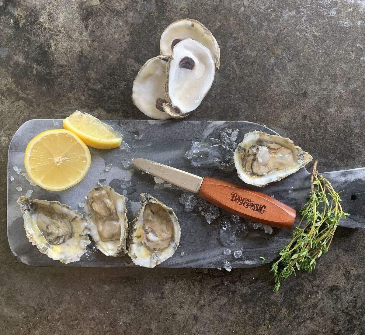 300-205 Oyster Shucker Knife Features Stainless Beveled Blade and Hardwood Handle Perfect For Opening Oyster Shells and Cutting Loose the Meat
